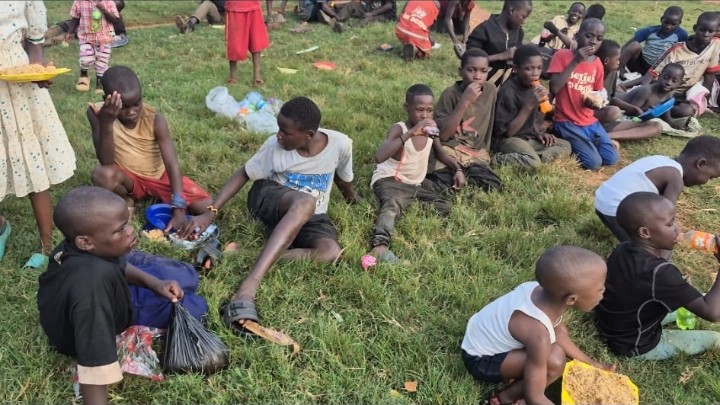 Children coming together for a warm meal and a little laughter - A Meal Shared, A Moment of Joy